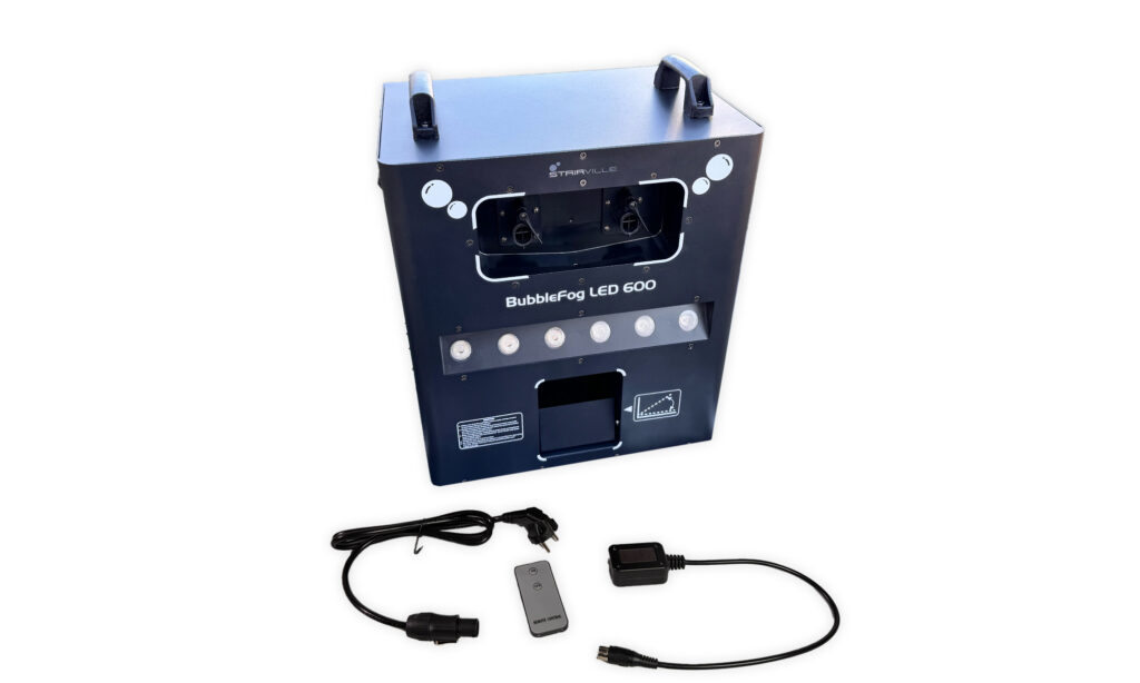 Darin das Gerät, Stromkabel und Fernbedienung